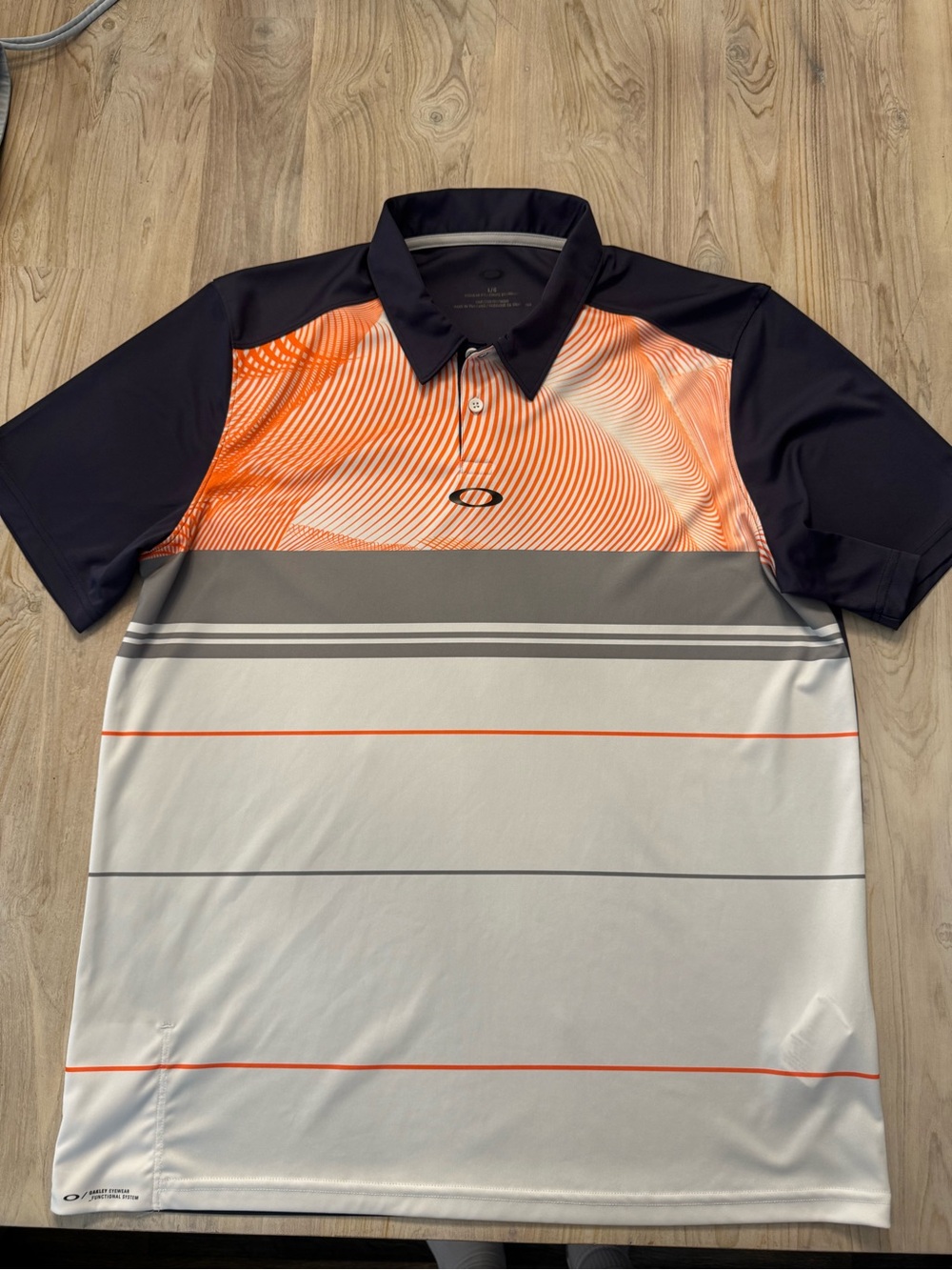 Oakley Men’s Blue, Orange & Gray Performance Golf Polo. Logo front & back